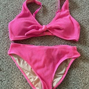 Blushing brunette pink bikini